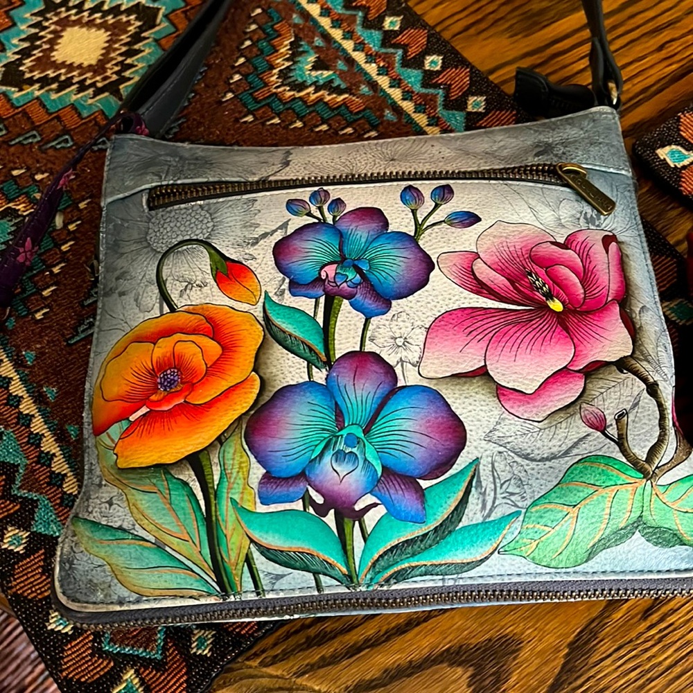 Anuschka purse 9” X 9”. Adjustable shoulder strap. Lightly used.
